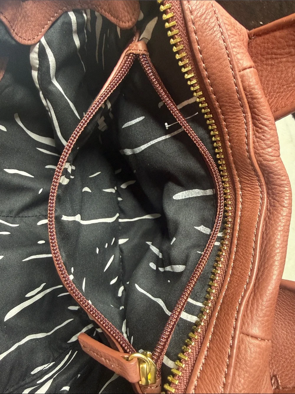 Kelsi Dagger Pebbled Leather Crossbody in Brick